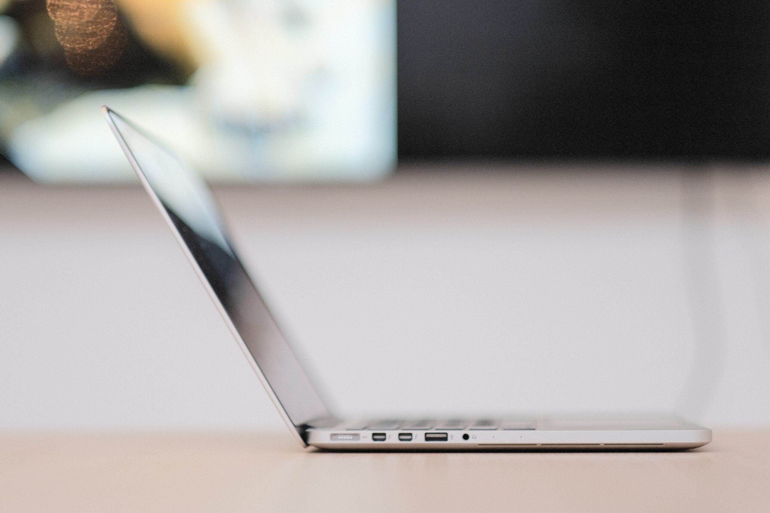 Side profile of a laptop, which can be used for teletherapy.